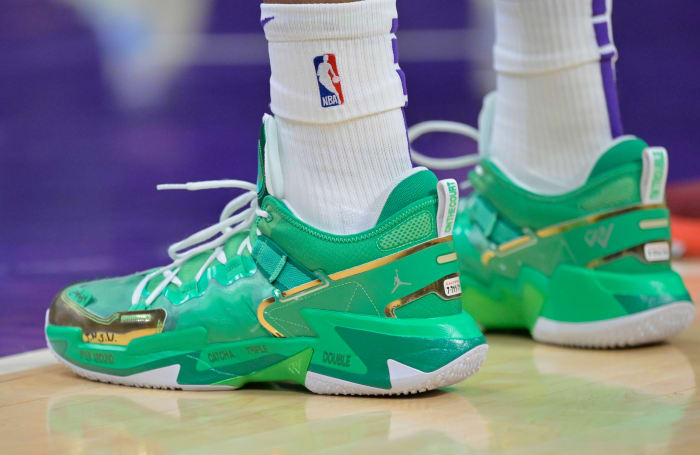 View of green Jordan shoes.